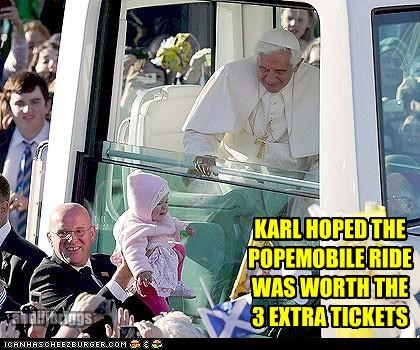 KARL HOPED THE POPEMOBILE RIDE WAS WORTH THE  3 EXTRA TICKETS