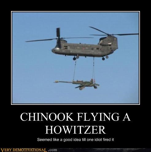 CHINOOK FLYING A HOWITZER