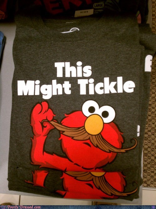 Poorly Dressed: Elmo Takes On A Creepy, Mustachioed, Persona