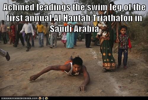 Achmed leadings the swim leg of the first annual Al Hautah Triathalon in Saudi Arabia