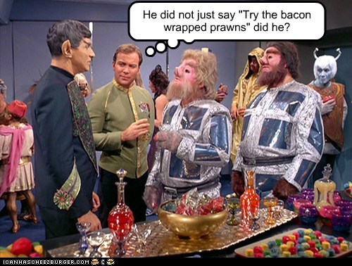 He did not just say "Try the bacon wrapped prawns" did he?