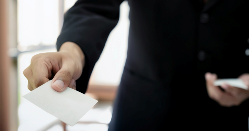 Salesman quits underpaid job, finds new use for business cards as he waits 6 hours for exit interview: 'I had nothing to do but wait'