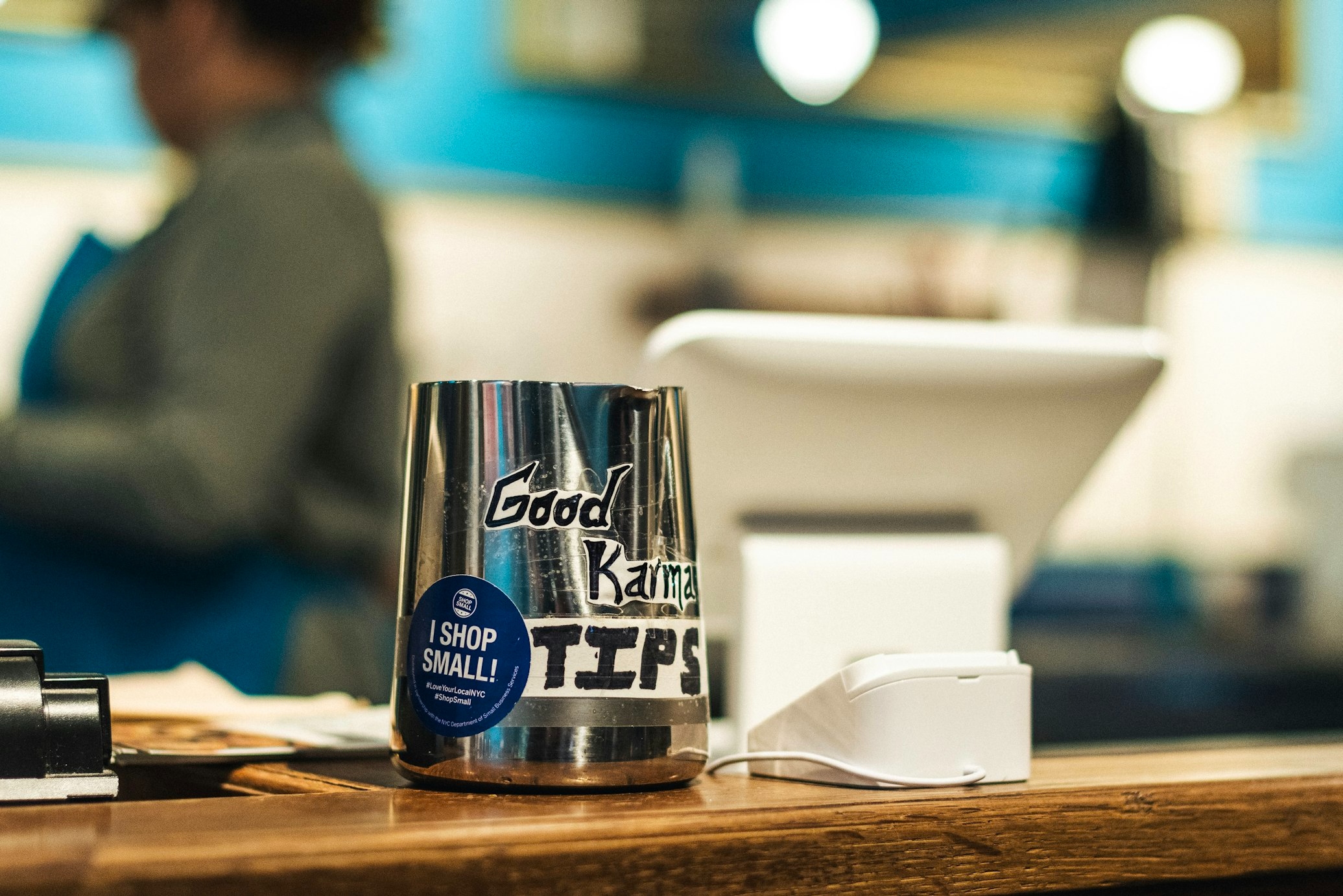 Barista new hire making $15 an hour at a small local Michigan coffee shop discovers that their boss has been keeping tips, which he insists is "to put into the business," and their coworker experienced retaliation when they confronted the boss about it