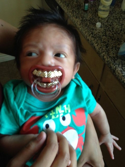 Baby Grillz Poorly Dressed fashion fail