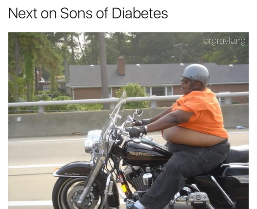 fat man on motorbike