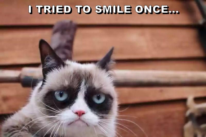 I TRIED TO SMILE ONCE... - Lolcats - lol | cat memes | funny cats ...