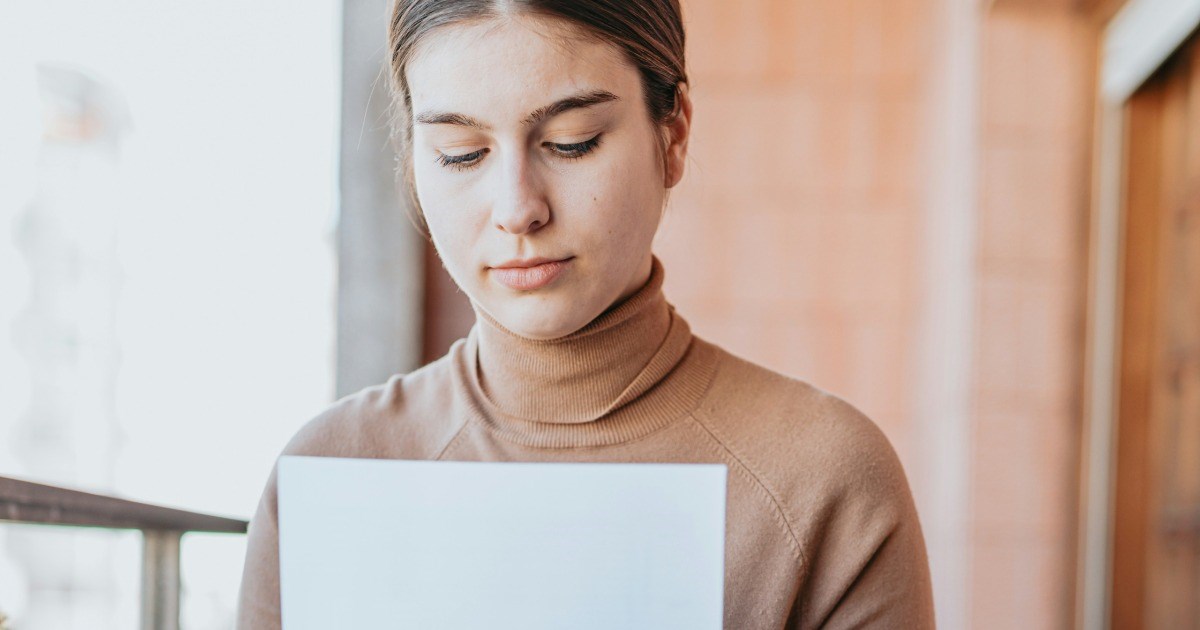 Resigning employee refuses to sign a “separation agreement,” demanding $5,000 per negative online post, and her firm threatens to withhold $2,200 in earned PTO if she doesn’t comply