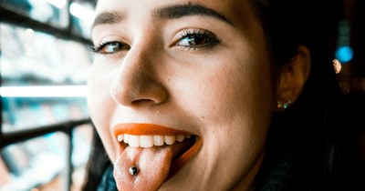 20-year-old works for parents for 4 years, gets fired after getting a tongue piercing: 'They're using it to punish me'
