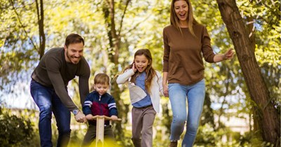 Parent of young kids finds neighbor trimming their trees, turning their back yard into an "absolute botch job" 