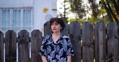 Woman saves for 20 years to buy her dream home and refuses to let disrespectful neighbors turn her backyard into a dumping ground: 'I’m throwing away 5 tennis balls a week'