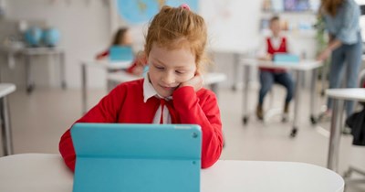 3rd-grade teacher makes students listen to stories on individual iPads with headphones instead of reading out loud to the entire class