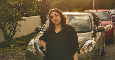 Neighbor parks two cars in front of residents' front door and refuses to move either, leading residents to report her unused car as an unregistered vehicle