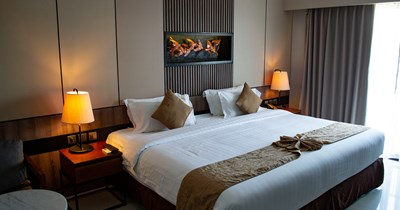 Guest comes into a hotel with a reservation under his wife's name and complains he cannot access the suite without her, treats front desk employee poorly even though he's in the wrong: 'But we're married!'