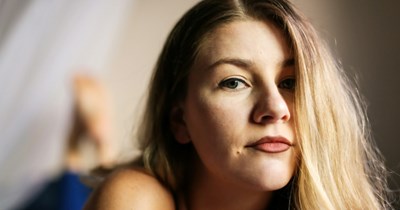 24-year-old receives $12,000 from neighbor, parents demand she loan $10k to her brother to buy a trailer: 'I am torn'