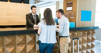 Hotel guest accidentally books two rooms through an online booking site, then blames front desk worker for not reading her mind: 'Why did you think I needed two rooms?'