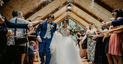 Friend is having a wedding reception at a restaurant without letting the establishment know beforehand, so she made 4 reservations and expects them to manage it: 'The guests are paying for themselves and I don’t think they are aware of this plan.'