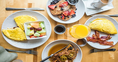 Sister's husband wants to flex his promotion by inviting breakfast but then gets upset about paying for what the brother ordered, even though he always eats the same thing: 'I would have happily paid the bill, like I usually do'