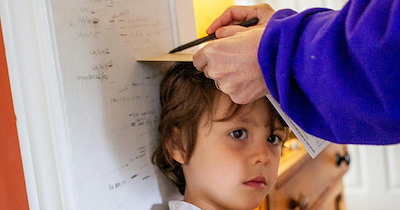Mother-in-law refuses to apologize after she paints over grandkids' doorframe height chart without parents' permission: 'Not even giving it a second thought'