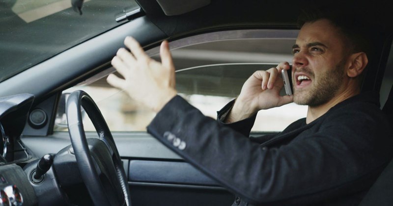 An angry driver yelling at the bus for stopping in front of his house while his neighbor boards the bus
