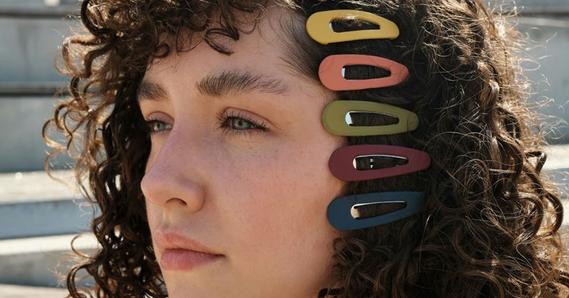 18-year-old woman wears hair clips she bought with her own money, against her mother's wishes