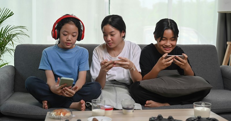 Family teenagers parenting raising teens headphones - 44604165