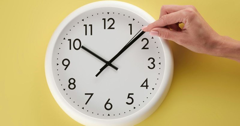 A phantom hand turns a clock backwards.