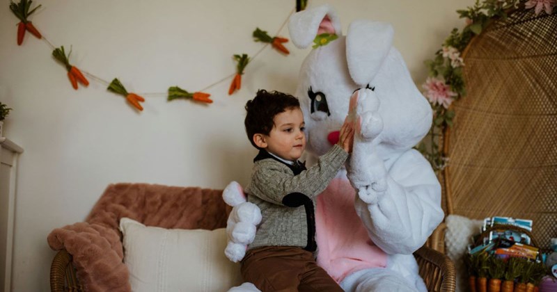 A little boy meeting the Easter Bunny