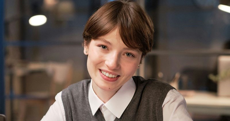 A young, confident consultant who thinks her energy level is what makes her valuable in the workplace.