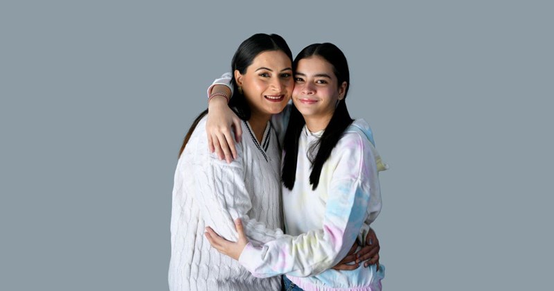 Aunt hugs her beloved niece, whom she has been raising on and off since she was 3-years-old.