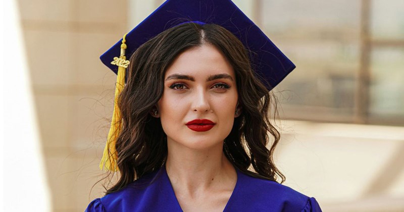 A young woman graduating with a degree in theater who has no idea how difficult it's going to be to pay off her student loans.