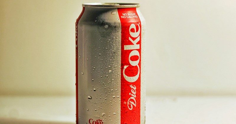 A can of Diet Coke against a white background