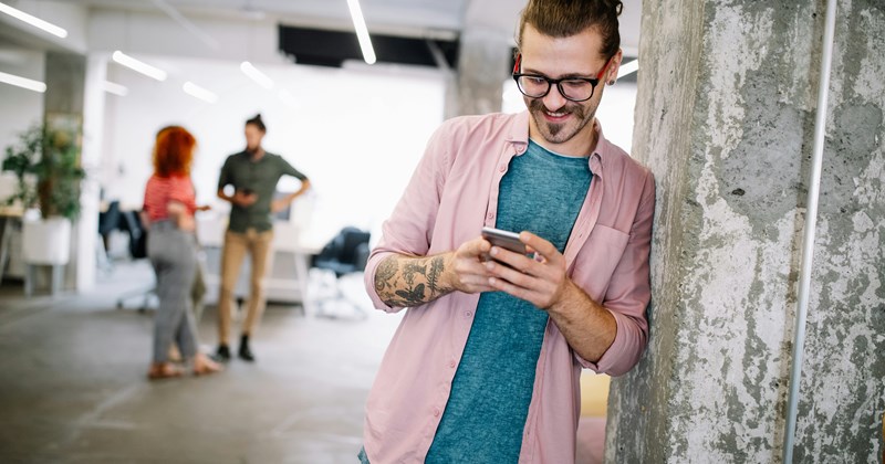 coworkers texting Coworkers - 45342981