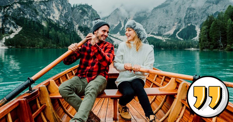 Romantic couple on a boat visiting an alpine lake at braise lake at braise Italy