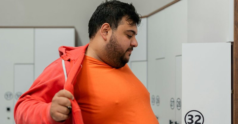 An obese trucker packs up his locker after getting fired for not using his CPAP machine.