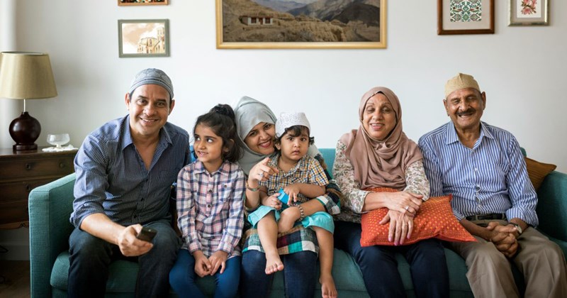 an extended family, who are staying at their family member's apartment for three weeks against her roommate's will.