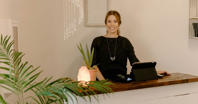 a spa employee who refuses to wear the uniform, opting to wear her own clothes instead. 