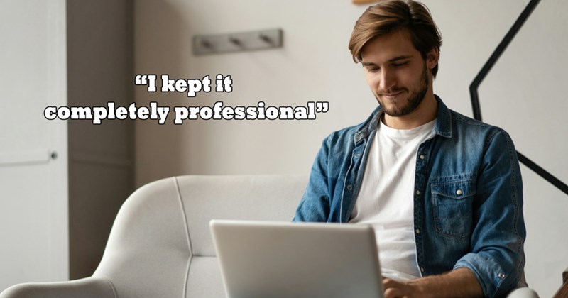 A man sits in a chair and types on a laptop on his lap