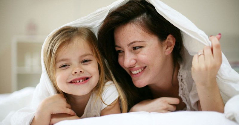 A mom and her 5-year-old daughter.