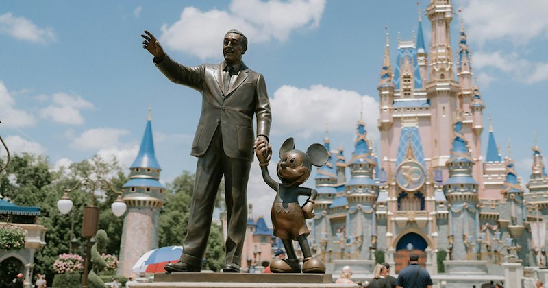 Walt Disney and Mickey Mouse statue at Disneyland Orlando. 