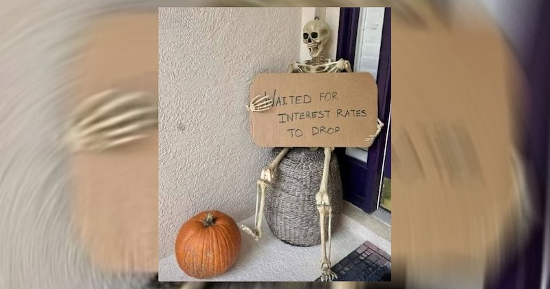 A skeleton Halloween decoration on a porch