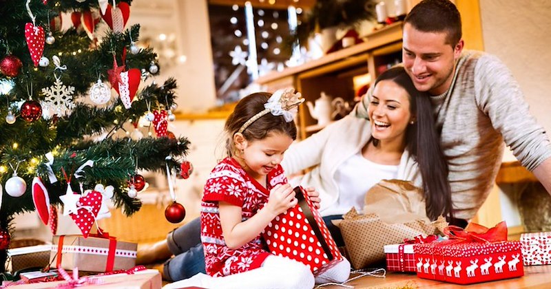 A young family spends Christmas together after deciding to stay home and have a private celebration.